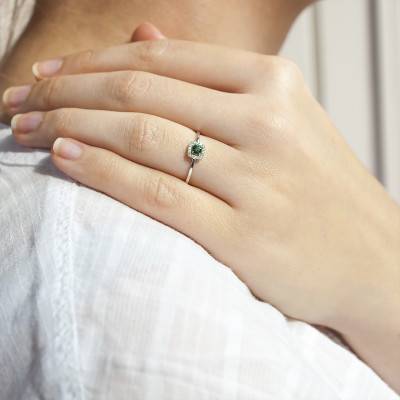 750 White Gold Emerald 0.14 ct and Diamond Halo 0.07 ct Solitaire Ring - Diamond Lady