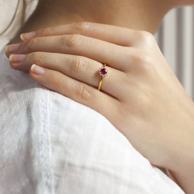 750/1000 Yellow Gold Daisy Flower Ring with 0.32 ct Ruby & 0.08 ct Diamond Halo - Diamond Lady