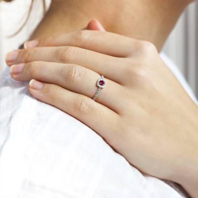 750 White Gold Ruby 0.16ct and Diamond Halo Solitaire Ring - Diamond Lady