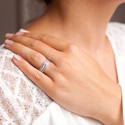 750/1000 White Gold Diamond Solitaire Ring with Accent Stones 0.10 ct - Joelli