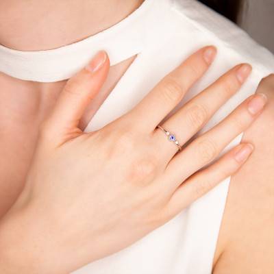 375/1000 White Gold Tanzanite & Diamond Accented Solitaire Ring - Aurora