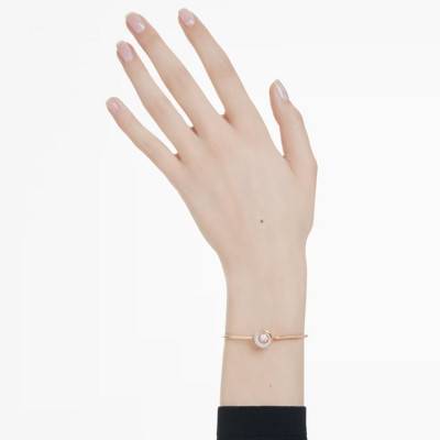 "Rose Gold-Toned Metal & White Crystal Dextera Bangle Bracelet, Adjustable Length 17 cm - 5692259" - Swarovski