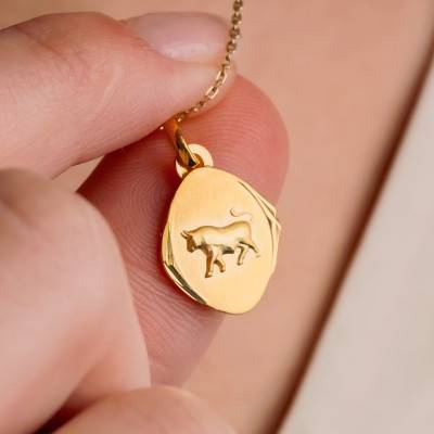 750/1000 Yellow Gold Faceted Taurus Zodiac Medal - Emanessence