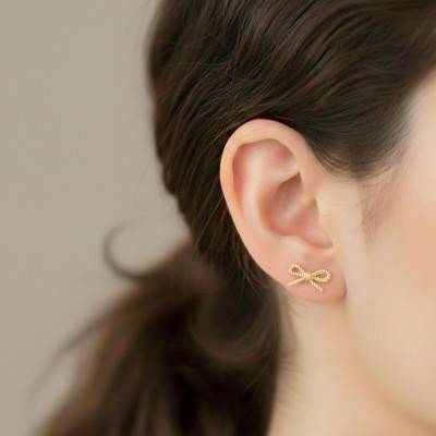 375 Yellow Gold Twisted Knot Stud Earrings - Emanessence