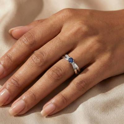 750/1000 White Gold Crossover Solitaire Ring with 0.34 ct Sapphire & Cubic Zirconia - Aurora