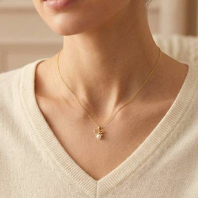 Pendentif Noeud Petite Perle en Or Jaune 375 - Ocarat