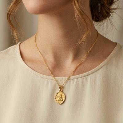 Yellow Gold 375 Oval Pensive Angel Chiseled Edge Medal - Lumiosa