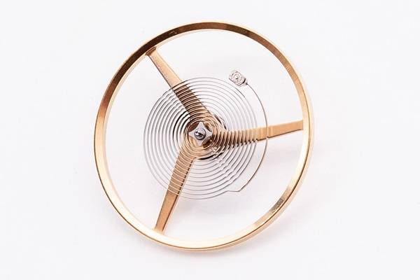 Balancer spiral d'une montre mécanique (Source : Wikipédia)